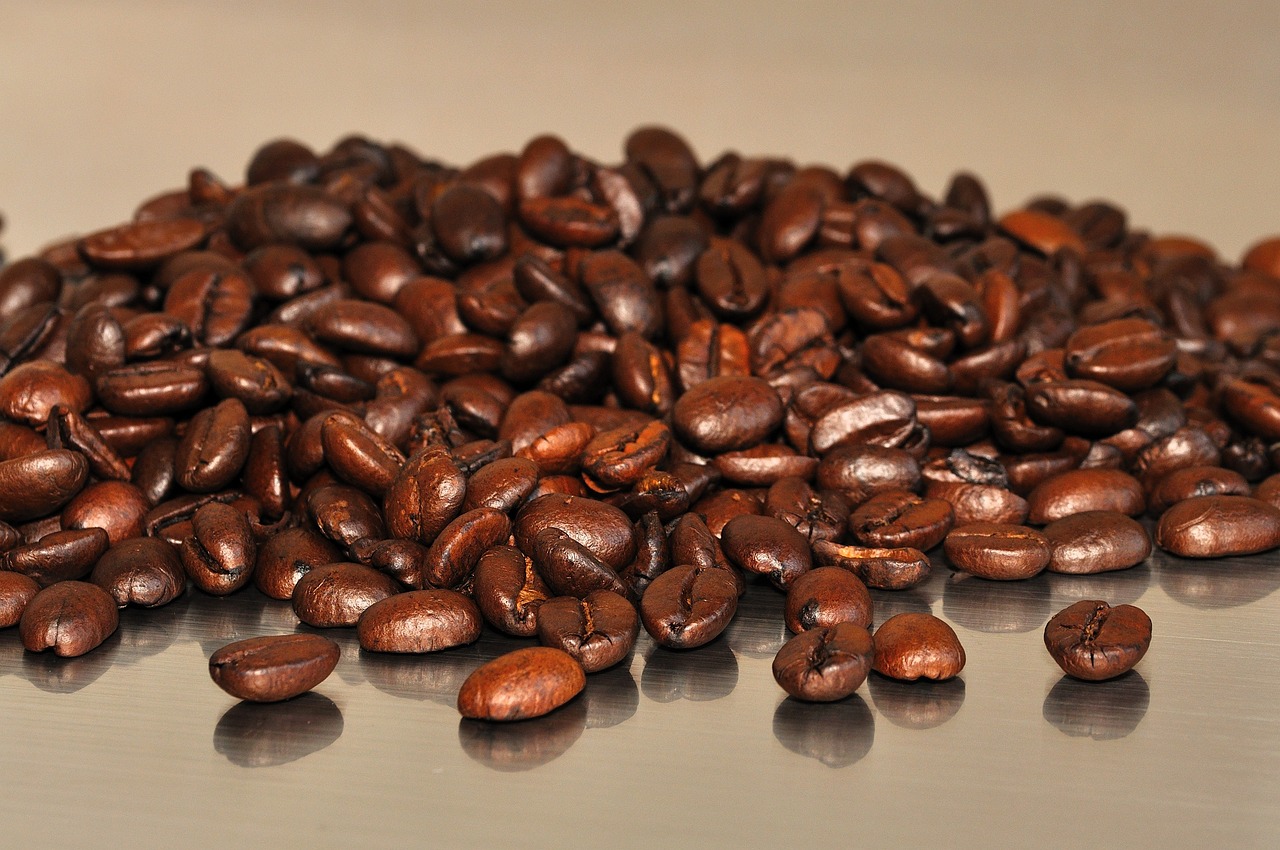 Roasted coffee beans representing The Organic Bean Cafe
