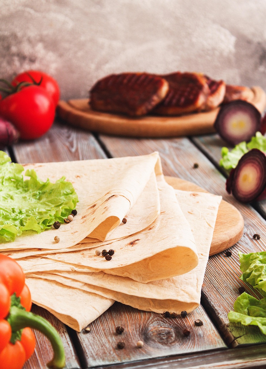 Pita filled with fresh vegetables representing Pita Jungle