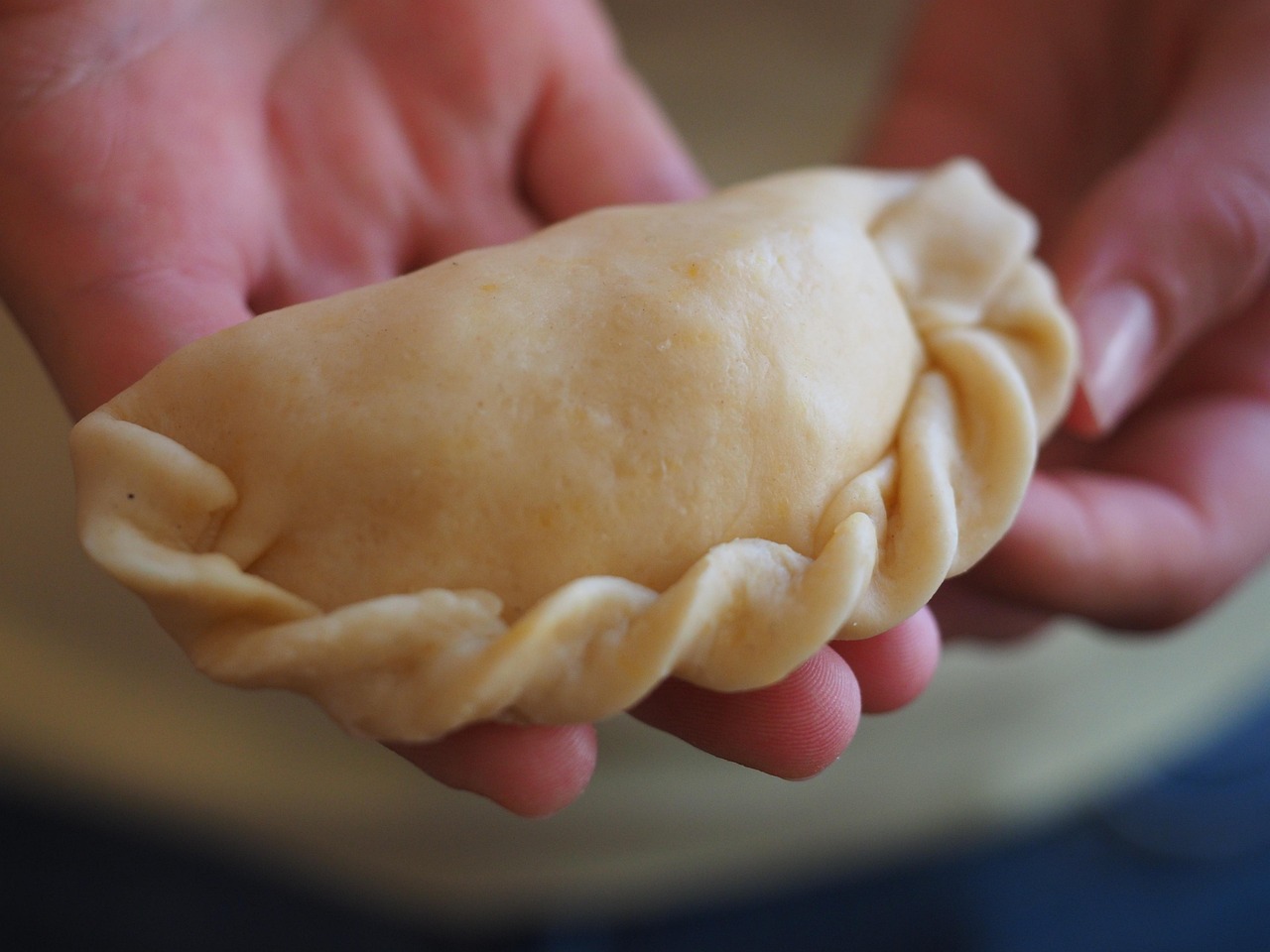 Golden empanadas representing Republica Empanada